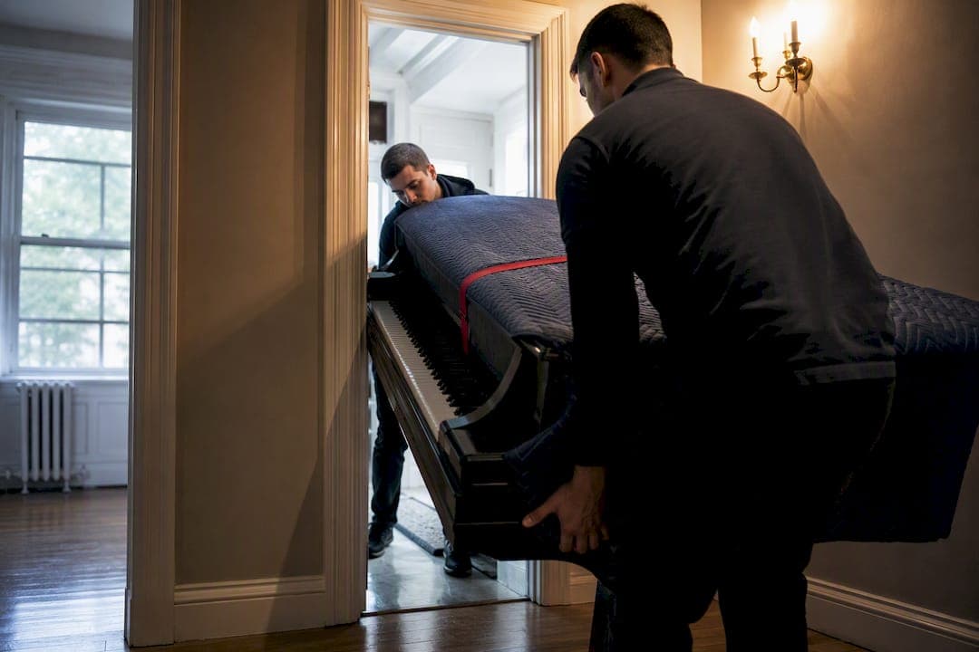 NYC Piano Moving Costs: Uprights $250–$550; Grands $400–$1,200+